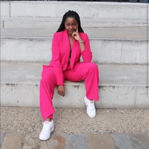 Hot pink power suit.